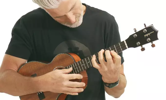 Man Holding Ukulele