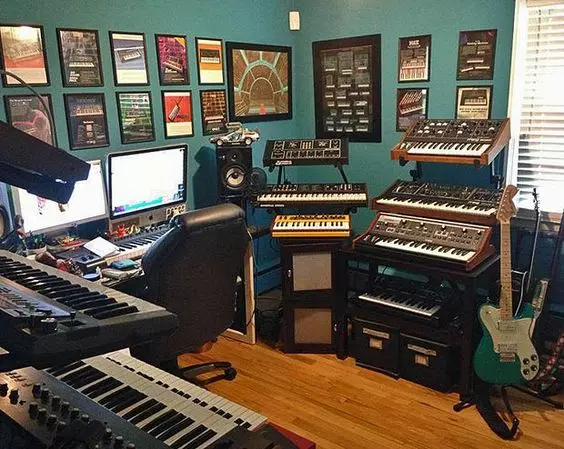 Home Recording Studio - Two Computer Monitors, Blue Room Color, Tan Desk Color, Keyboard, Guitar