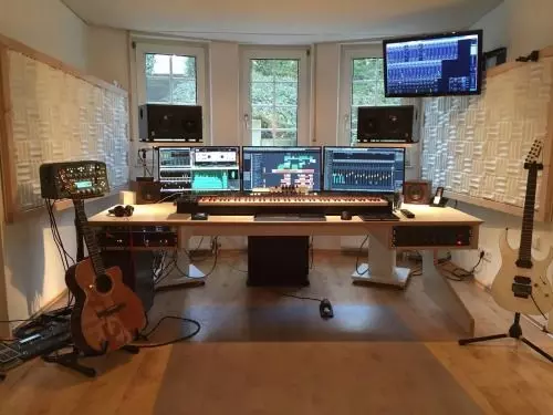 Home Recording Studio - Three Computer Monitors, White Room Color, Tan Desk Color, Keyboard, Guitar