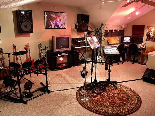 Home Recording Studio - One Computer Monitor, White Room Color, Tan Desk Color, Keyboard, Drums, Guitar
